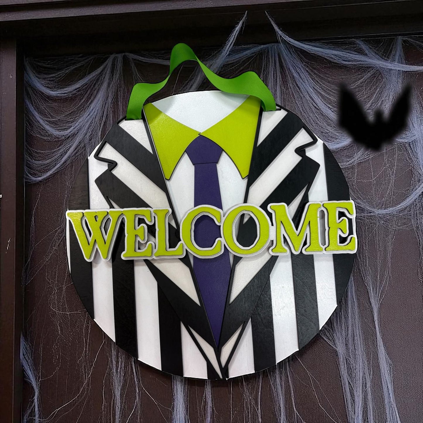 Beetlejuice door sign