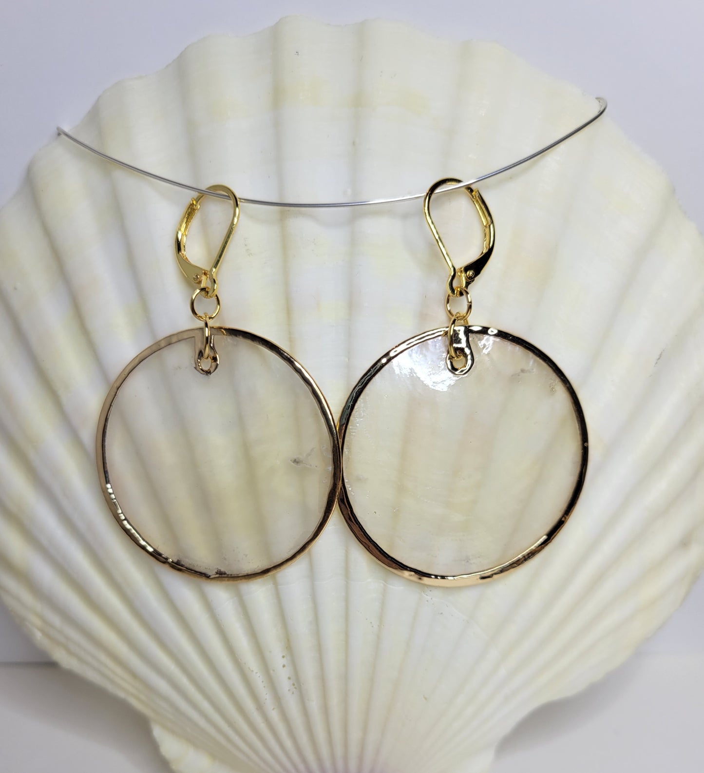 Large gold trimmed capiz shell earrings