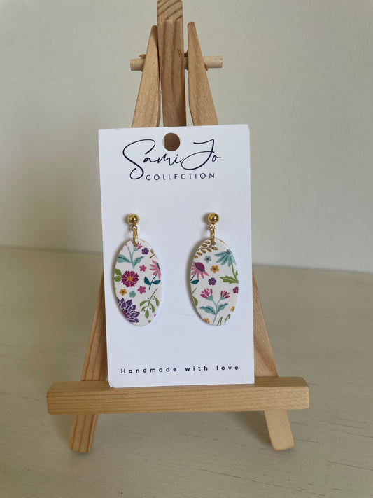 Floral oval dangles