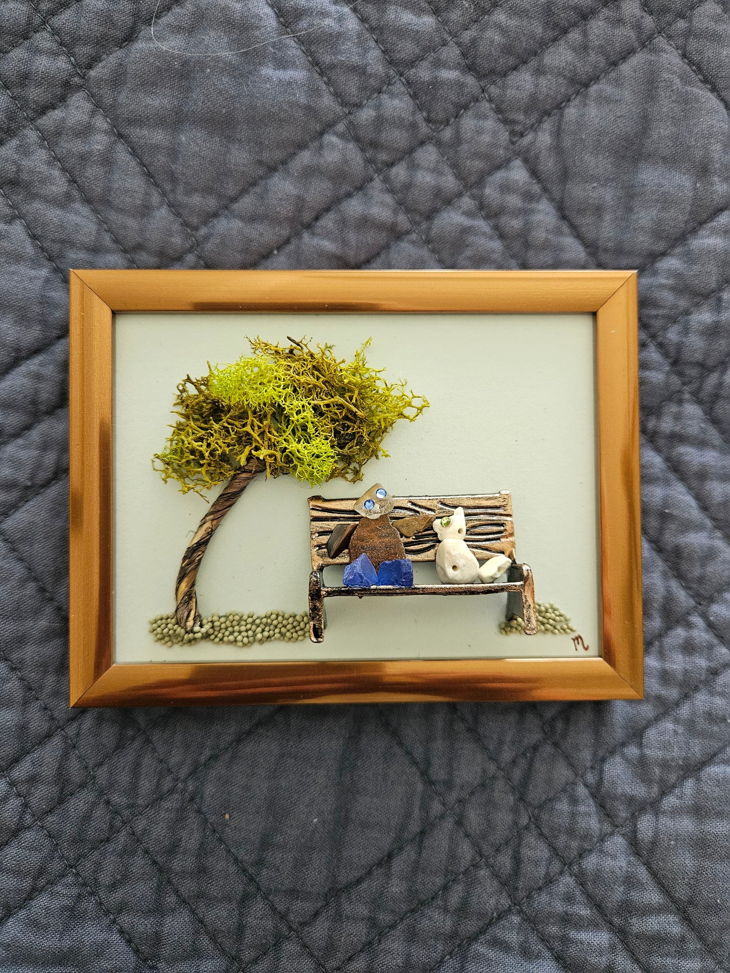 Sea Glass Person on Bench