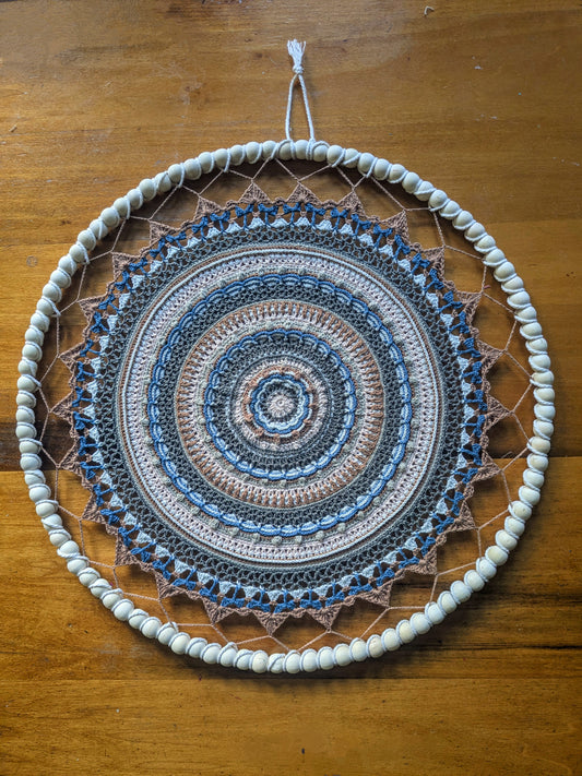 Crochet mandala with beaded wire frame
